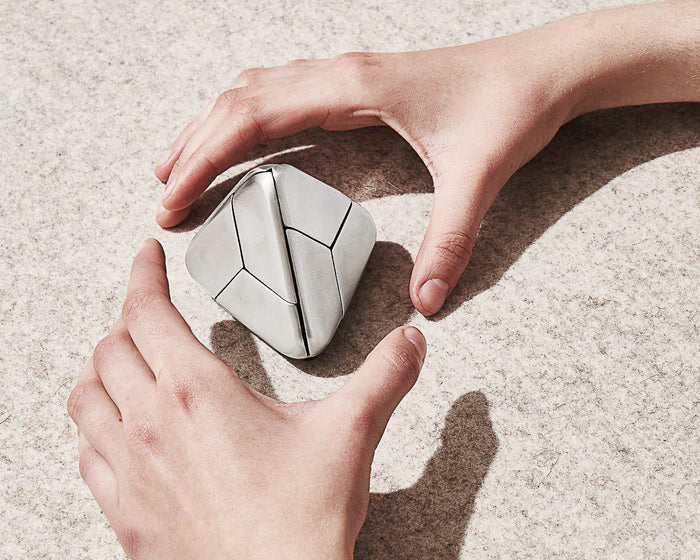 Tetra stainless steel puzzle