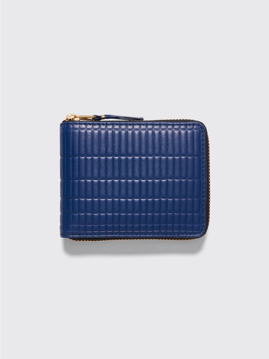 Comme des Garçons embossed checkered wallet with zip opening in blue