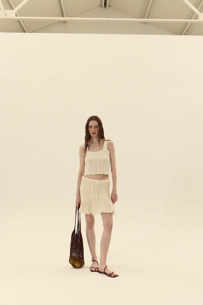 Dèluc | Mini jupe en maille 'Capri' | Blanc cassé 