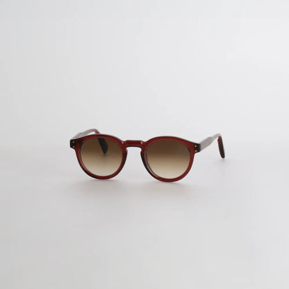 Steve McQueen Eyewear | Les lunettes de soleil ''BUD''  | Cristal rouge-brun 156