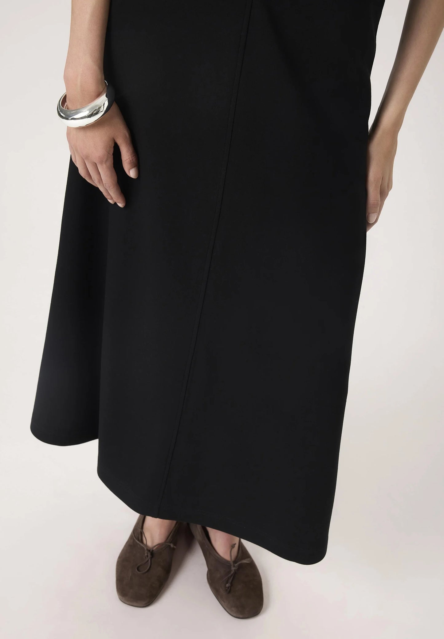SOAKED IN LUXURY | La jupe ligne A en jersey Marigold  - Noir