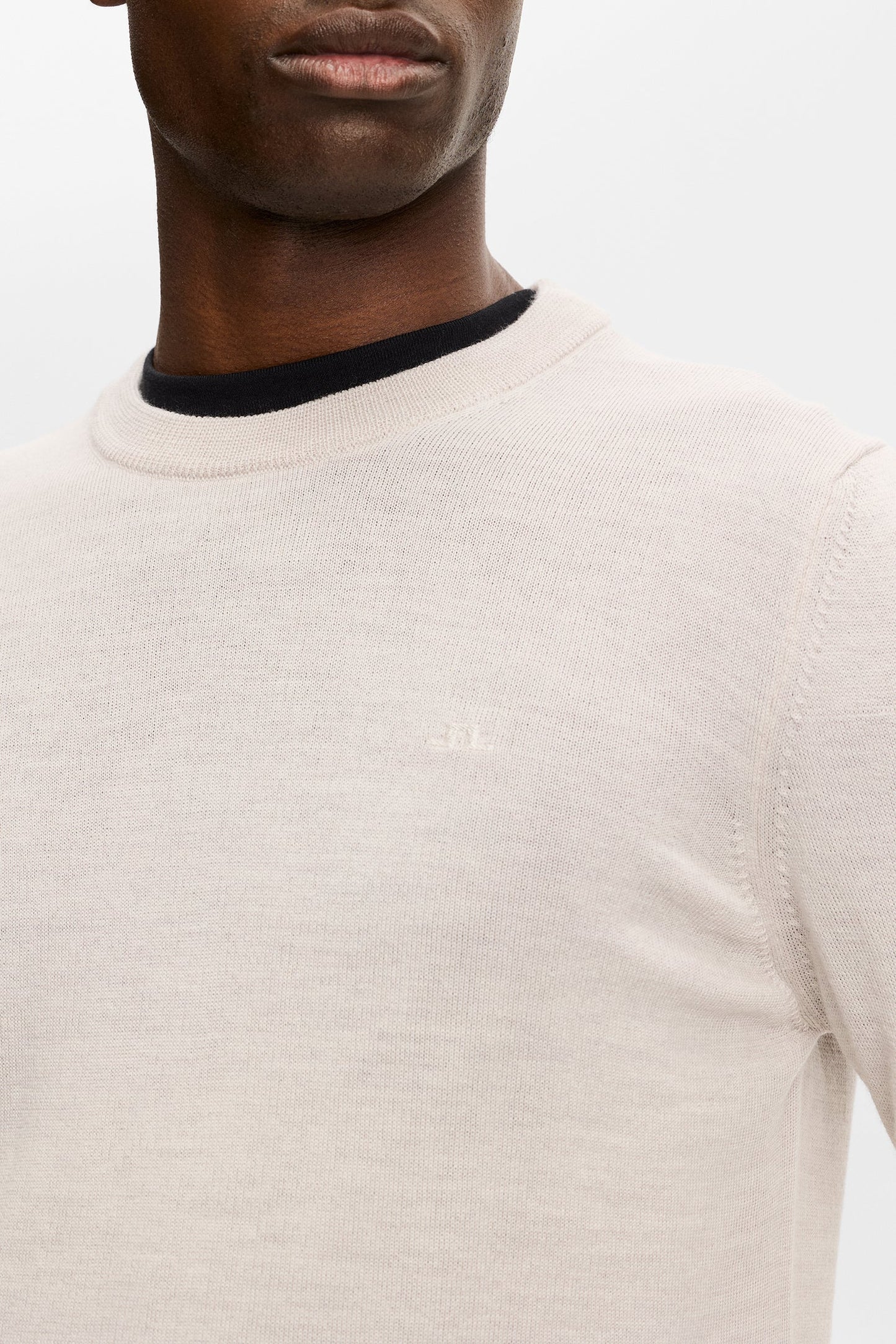 Le pull à col rond ''Keane'' en laine mérinos - blanc cassé