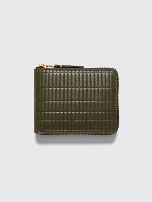 Comme des Garçons embossed checkered wallet with zip opening in green